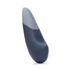 A sleek, light green clitoral vibrator with a smooth, ergonomic design.